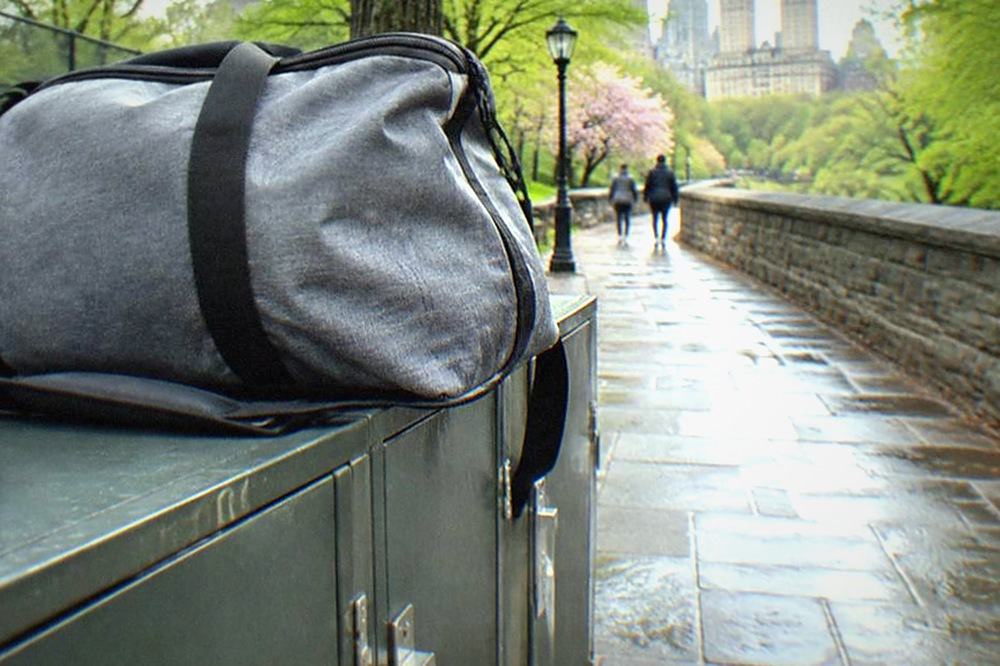 Coin-operated lockers built into a wall beside a walkway